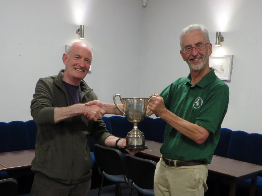 Stewrat 2021-2 Individula Champion receives trophy from John Southcote