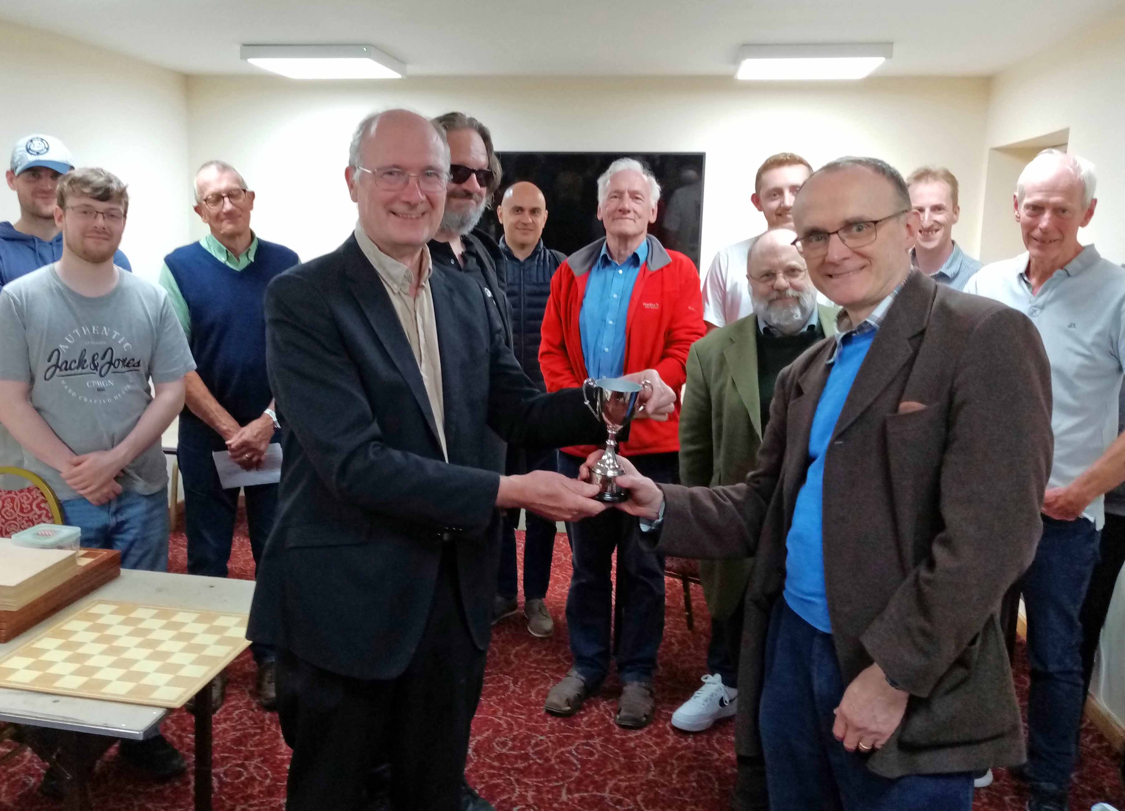 Nigel presents the cup tp Stepehen captain of Redditch