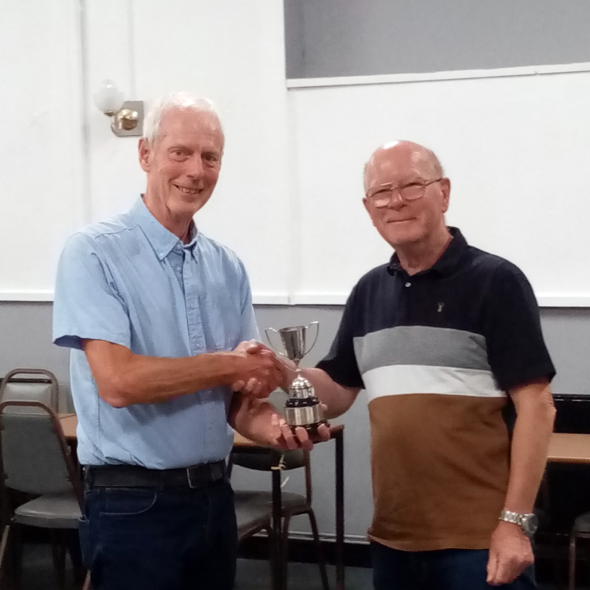 Kidderminster captain receives trophy for his team