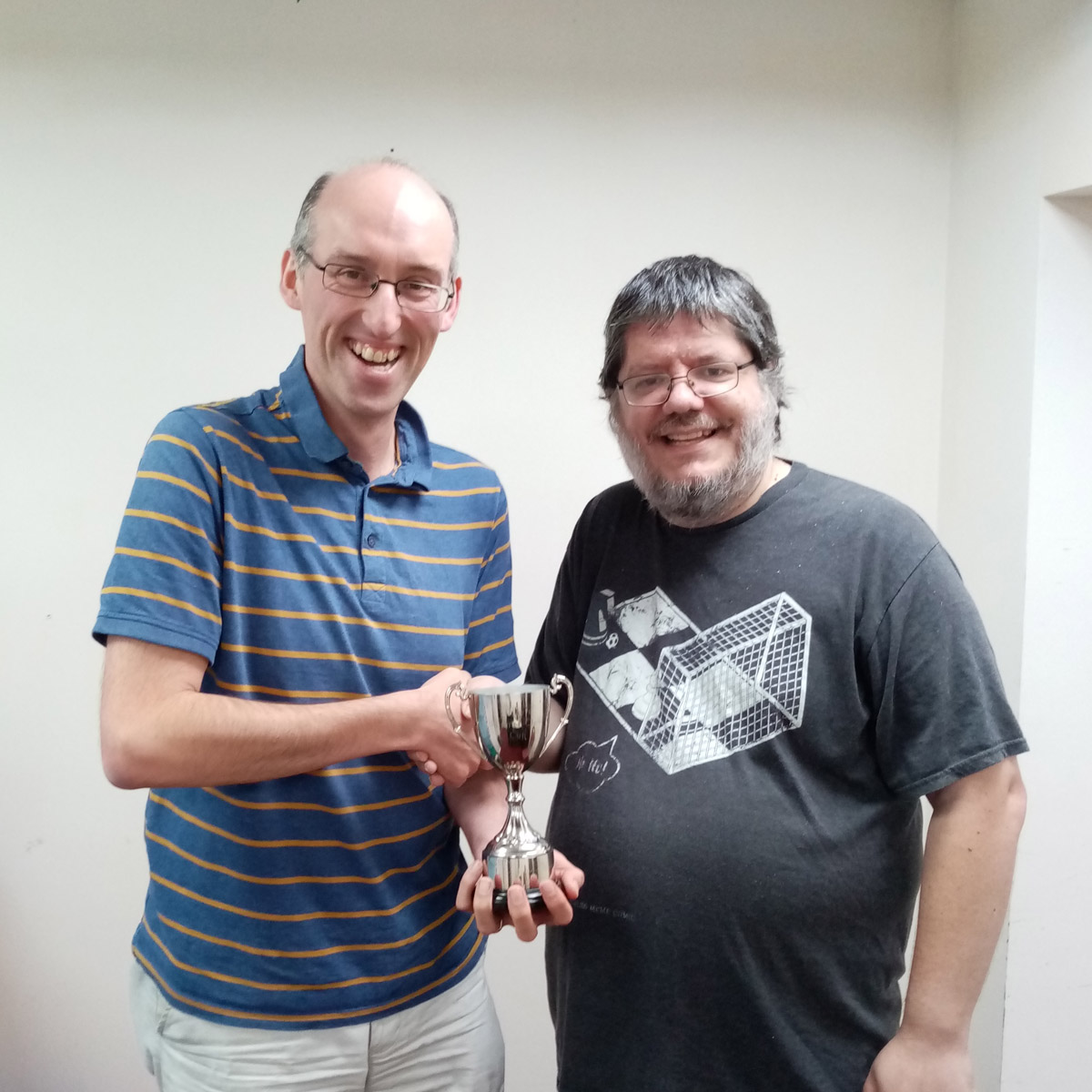 Longbridge board 1 receiving the Towers Cup from the controller